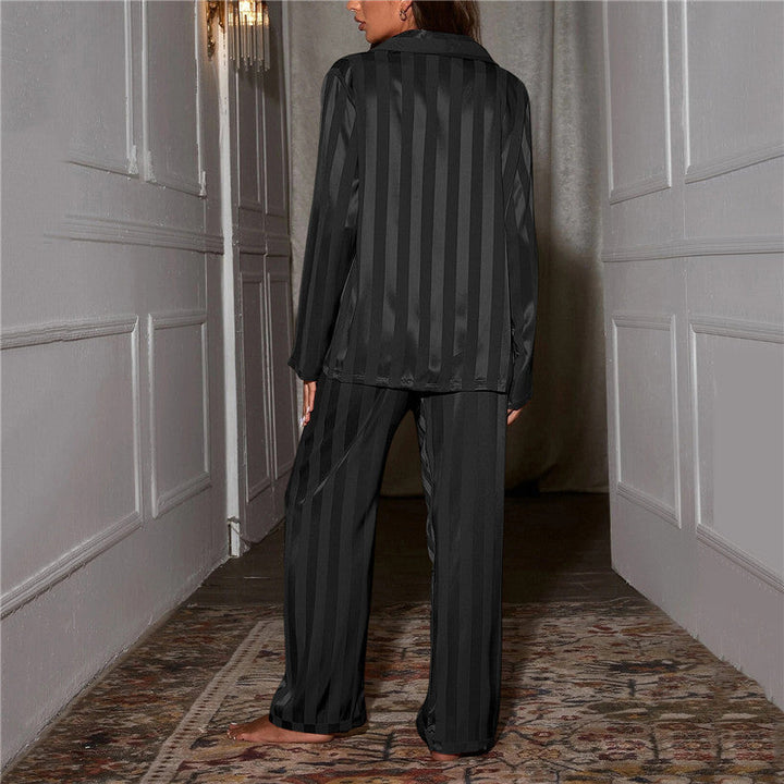 Women's high-quality silk pajama set, offering luxury & comfort for sleep.