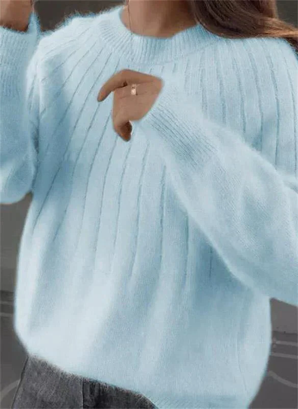 Pure cashmere women's soft knitted sweater, offering luxurious warmth & comfort in winter.