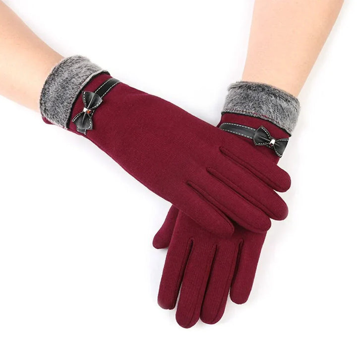 Black women's touchscreen gloves designed to operate phones easily. Stay warm & connected during cold winter days.