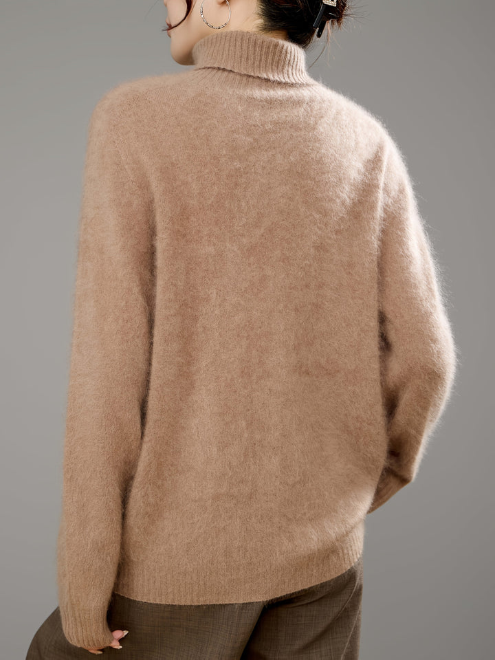 Super soft, cozy women's turtleneck sweater with a relaxed, elegant fit for winter warmth.