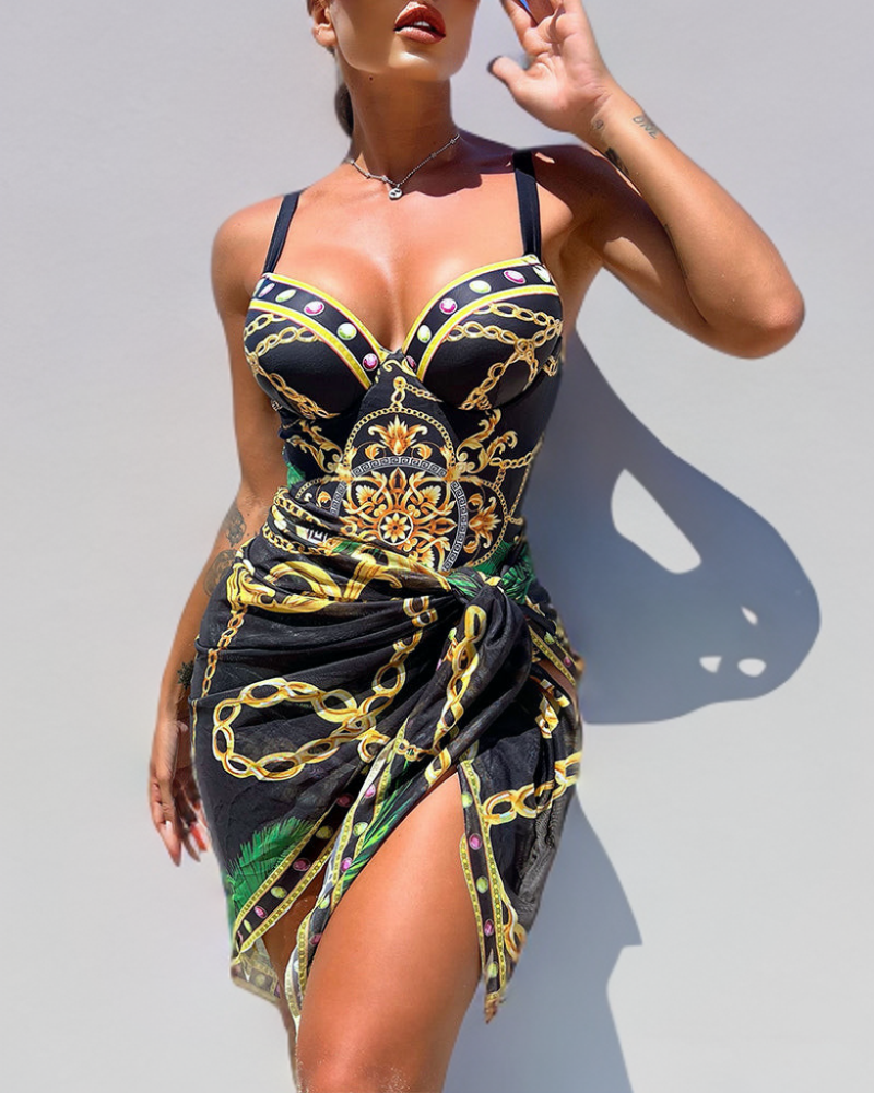 Women's luxury baroque chain print swimsuit set with jewel embellished top & matching wrap skirt for beach.