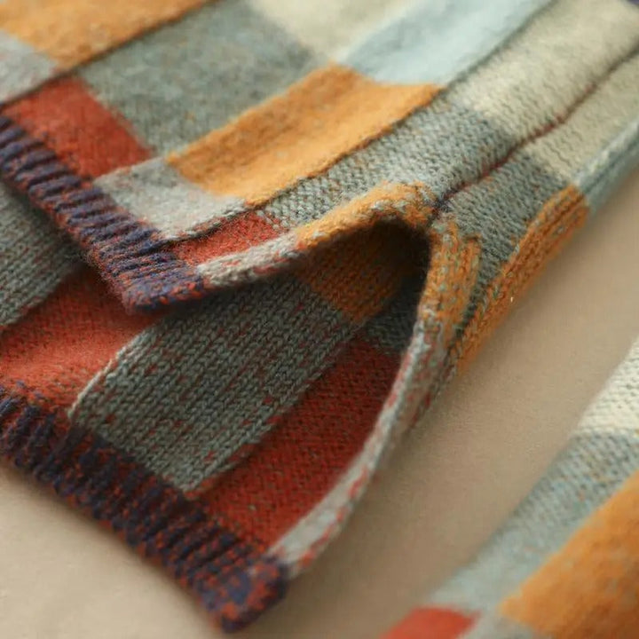 Stylish women's roll neck sweater in cashmere with contrasting patchwork, cozy garment