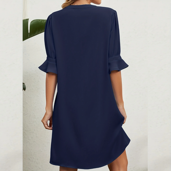 Luxe casual midi dress for women, Aurora. Elegant, comfortable, & versatile with a round neck and short sleeves.