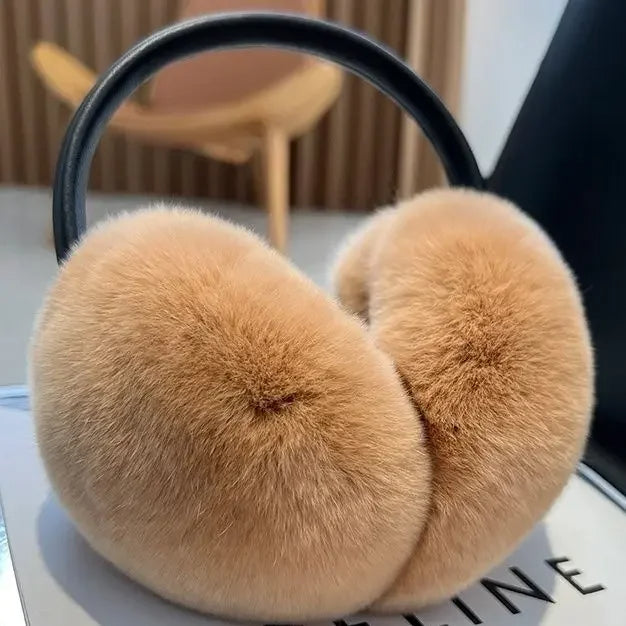 Women's luxury faux fur earmuffs, ultra-soft and warm for winter. Stylish cold weather fashion accessory for her.