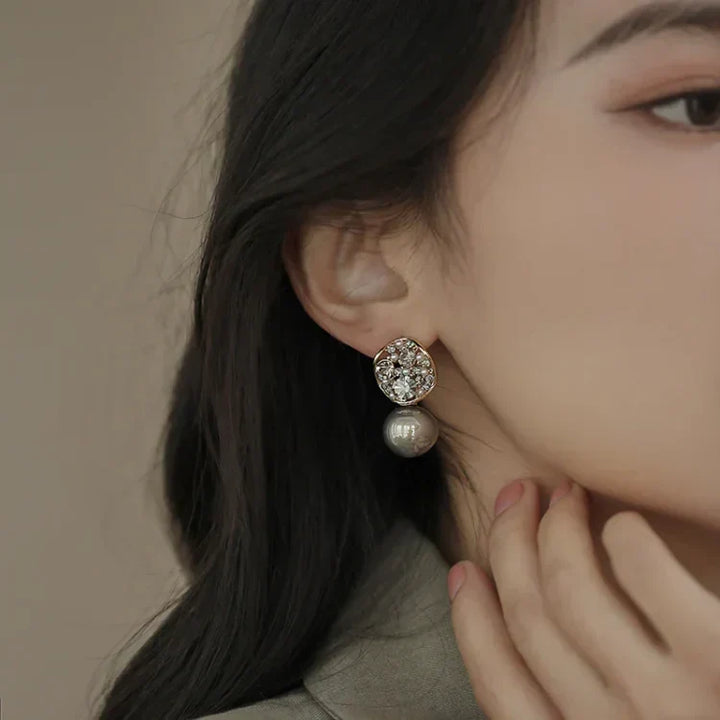 Women's luxury gray & taupe crystal pearl earrings, elegant accessory for special occasions.
