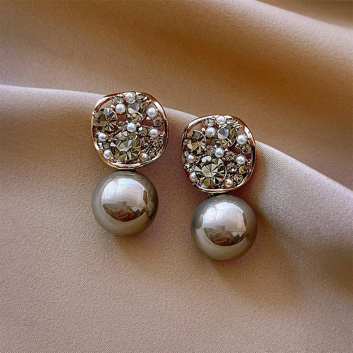 Chic women's luxury crystal & pearl earrings in gray and taupe, perfect elegant jewelry.