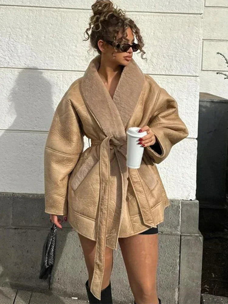 Elegant women's luxury Mirabelle winter coat, providing superior warmth with stylish leather and fur details.