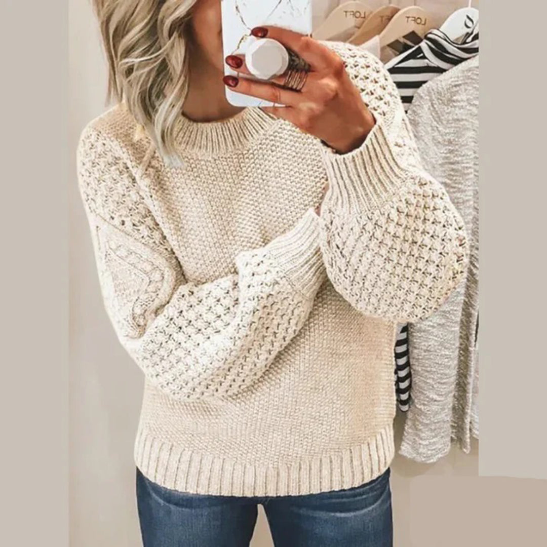 Women's luxury stylish knit sweater, perfect for elegant winter fashion.