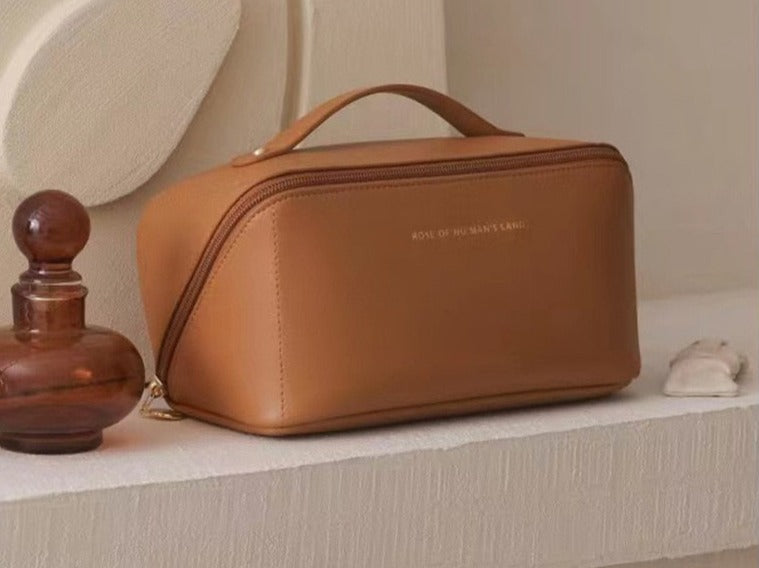 Luxury portable makeup bag, an ideal gift for her. Elegant women's travel beauty case for organized cosmetics.
