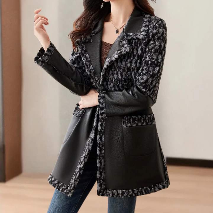 Women's luxury warm black winter coat, elegant and cozy for cold weather.