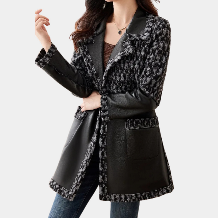 Warm black women's luxury jacket, elegant and cozy with a tailored fit for winter fashion.