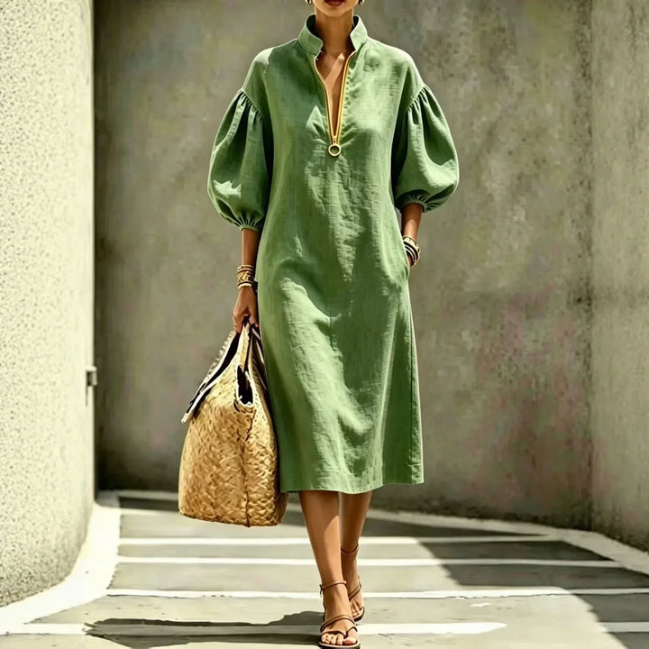 Comfortable summer midi dress for women. Madelyn casual style with half-zip and bubble sleeves. Ideal everyday fashion.