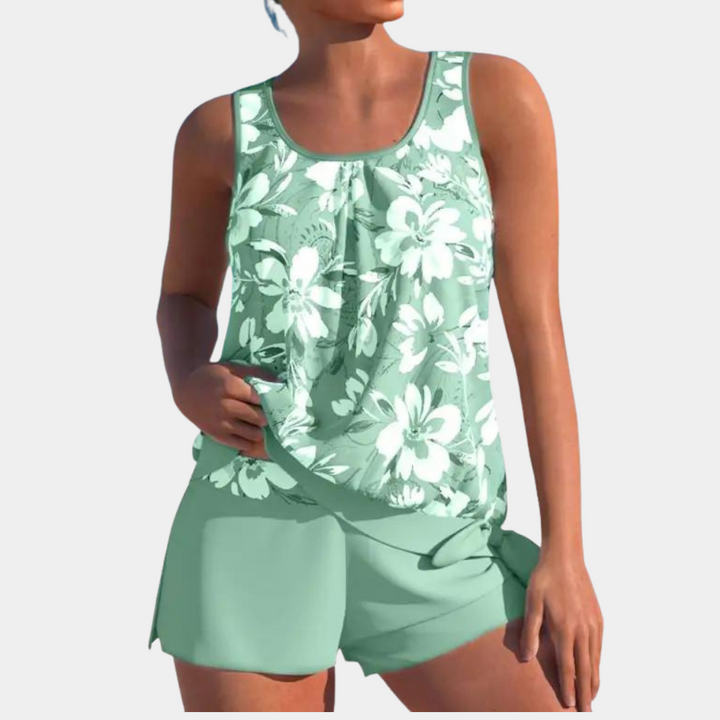 Comfortable women's Malia tankini top and bottom, two-piece swimsuit ideal for relaxing poolside.