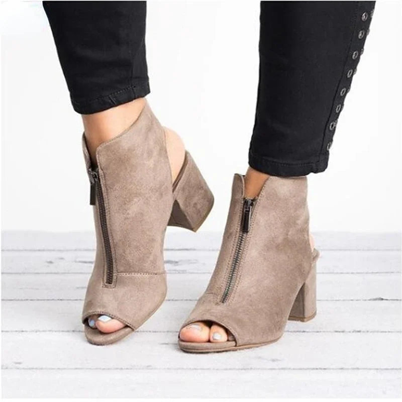 Elegant women's Marcelline zip block heels. Comfortable open-toe dress shoes, versatile for day-to-night modern style.