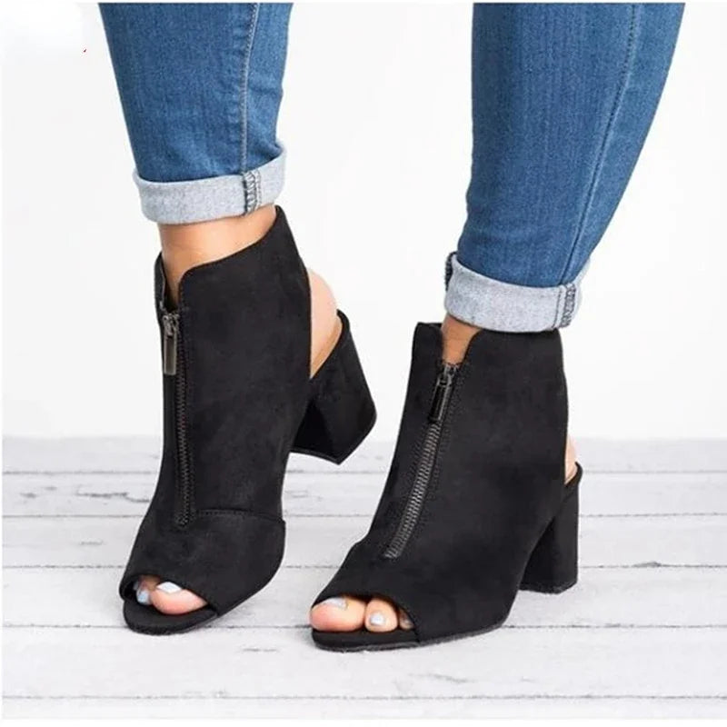 Detailed view of burgundy Marcelline women's zip heels. Open-toe, chic block heel design offers style & comfort.