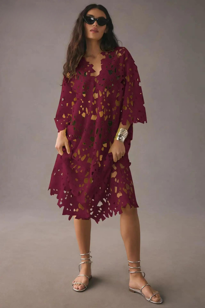 Lightweight women's long summer dress with a flowing silhouette, ideal for spring and warm weather.
