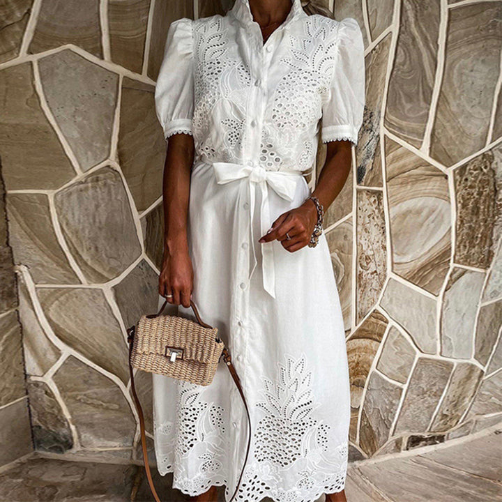 Elegant white Marielle maxi dress for women. Flowy, lightweight, and perfect for summer vacations.