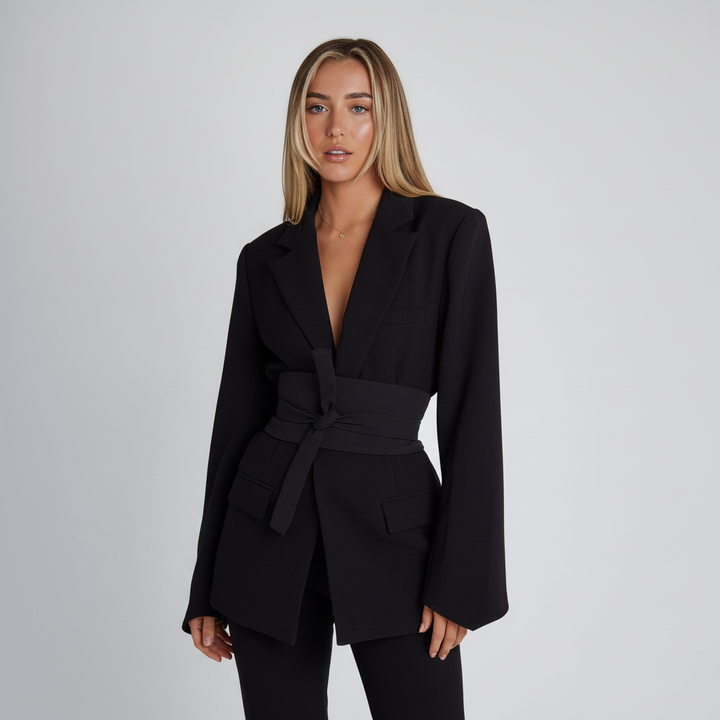 Model wearing a black women's slim fit blazer, ideal for workwear and smart casual outfits