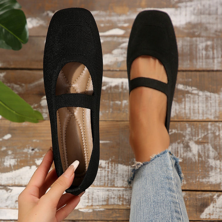 Women's comfortable smiling face Mary Jane ballet flats, slip-on style, adjustable strap, everyday wear.