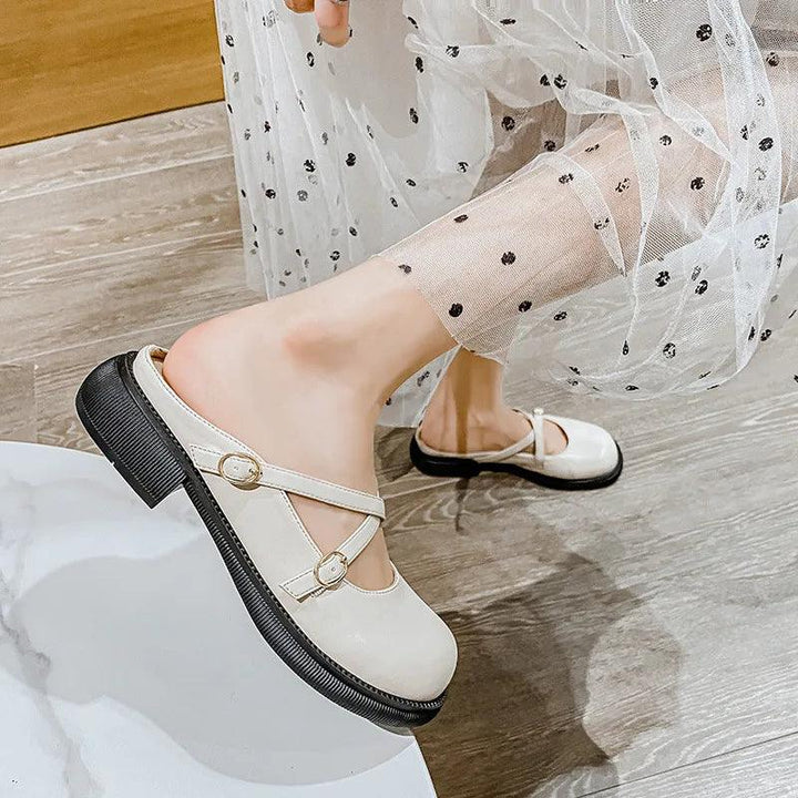 Women's Mary Jane pumps with an elegant buckle, classic style mid heel.