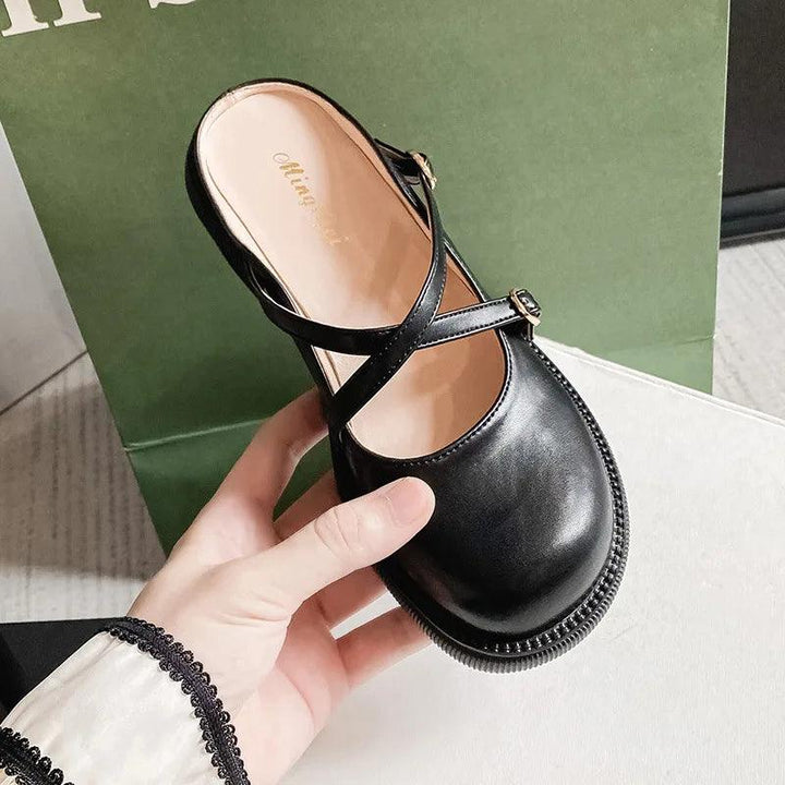 Versatile women's Mary Jane pumps with stylish buckle, suitable for casual or formal wear.