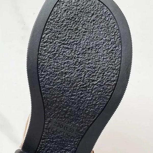 Women's Mary Jane buckle pumps, a classic and comfortable mid-heel shoe.