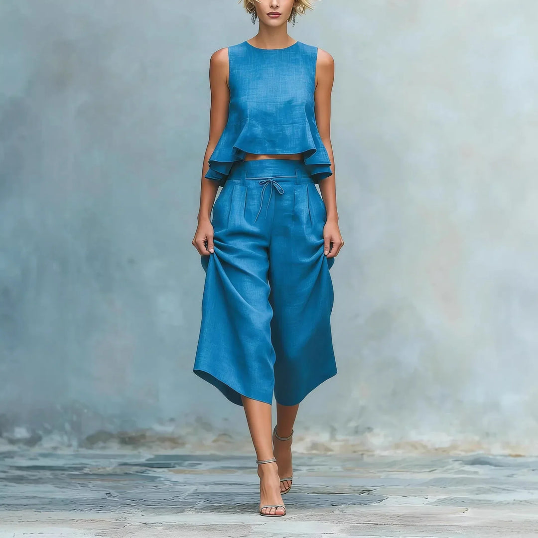 Women's matching crop top & wide leg pant set. Chic, relaxed fit for casual summer style.