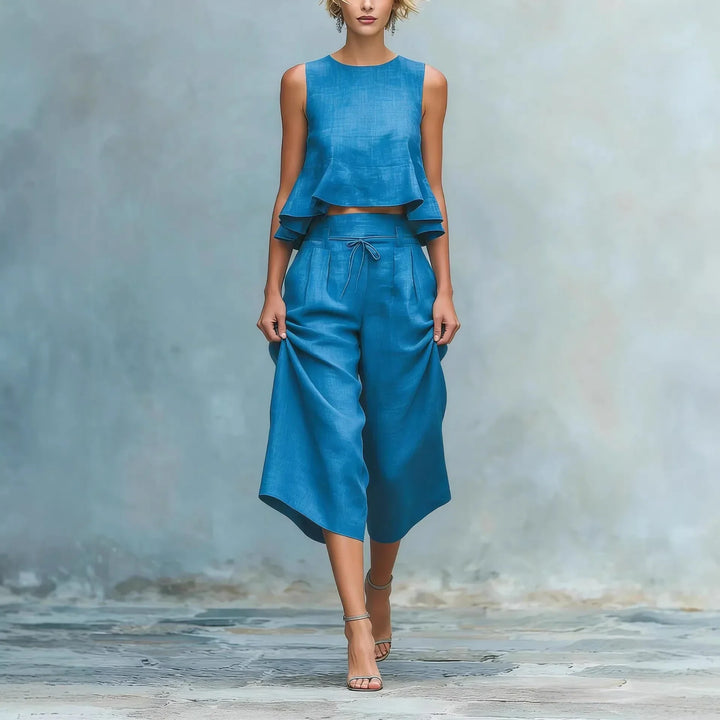 Women's matching crop top & wide leg pant set. Chic, relaxed fit for casual summer style.