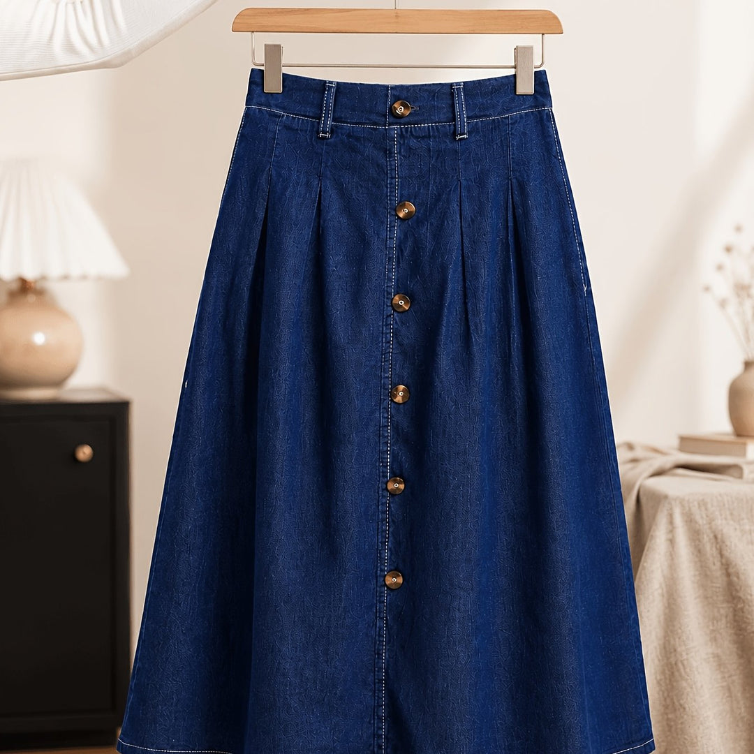 Women's medium blue A-line midi skirt, button front & pleats. Great for casual, chic spring & summer outfits.