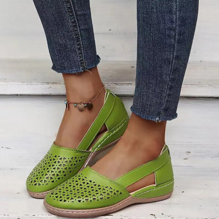 Breathable fabric detail of comfortable women's summer walking shoes.