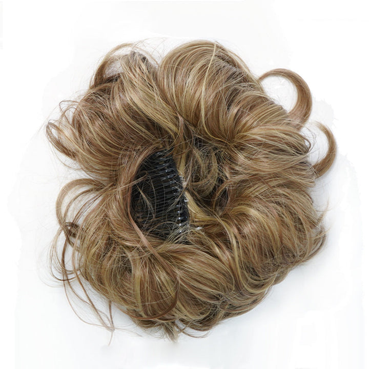 Realistic messy clip-in bun hair extension for women, blends seamlessly for a natural updo.