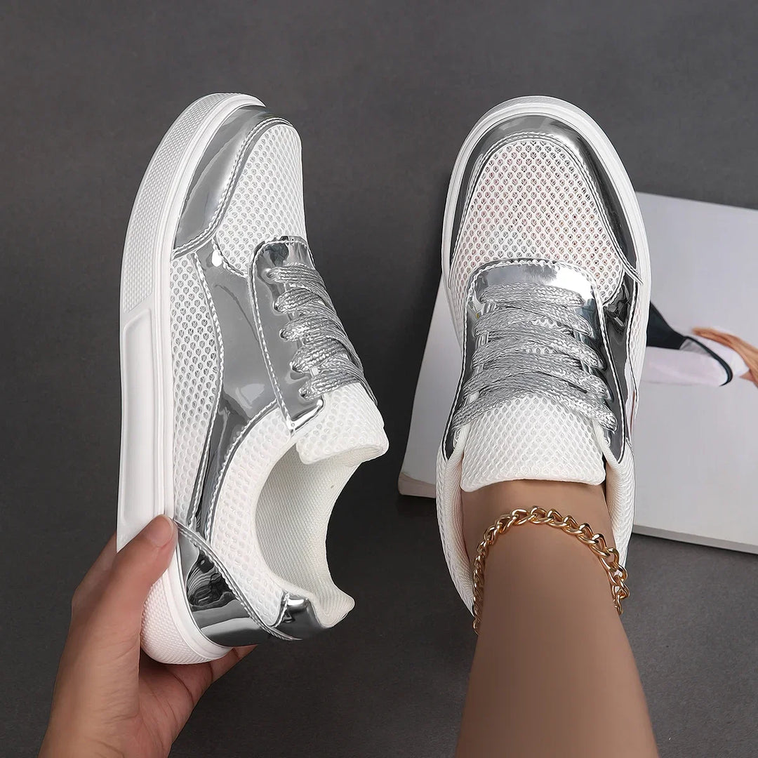 Casual women's metallic mesh sneakers. Breathable, chic lace-up shoes for everyday style and comfort.