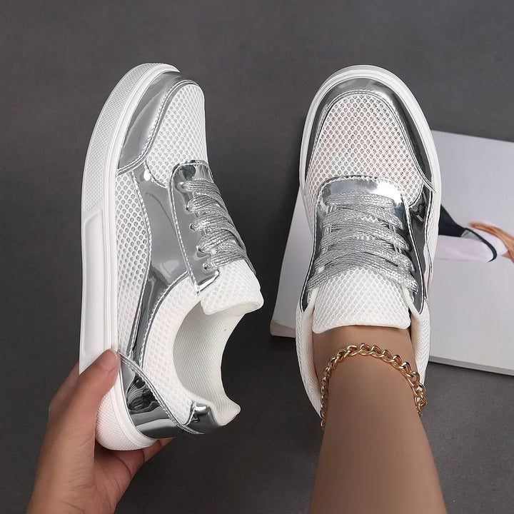 Casual women's metallic mesh sneakers. Breathable, chic lace-up shoes for everyday style and comfort.