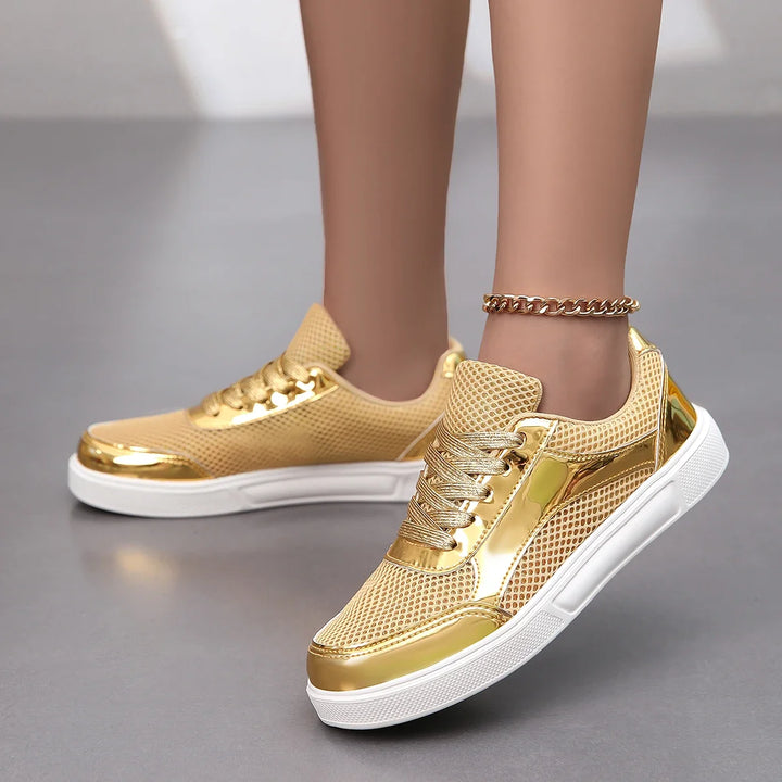 Fashionable women's metallic mesh sneakers. Breathable & chic lace-up shoes for comfortable, stylish walking.
