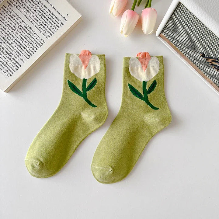Soft cotton blend women's mid-calf floral socks. 5-pair set, comfortable, breathable, and stylish patterns.
