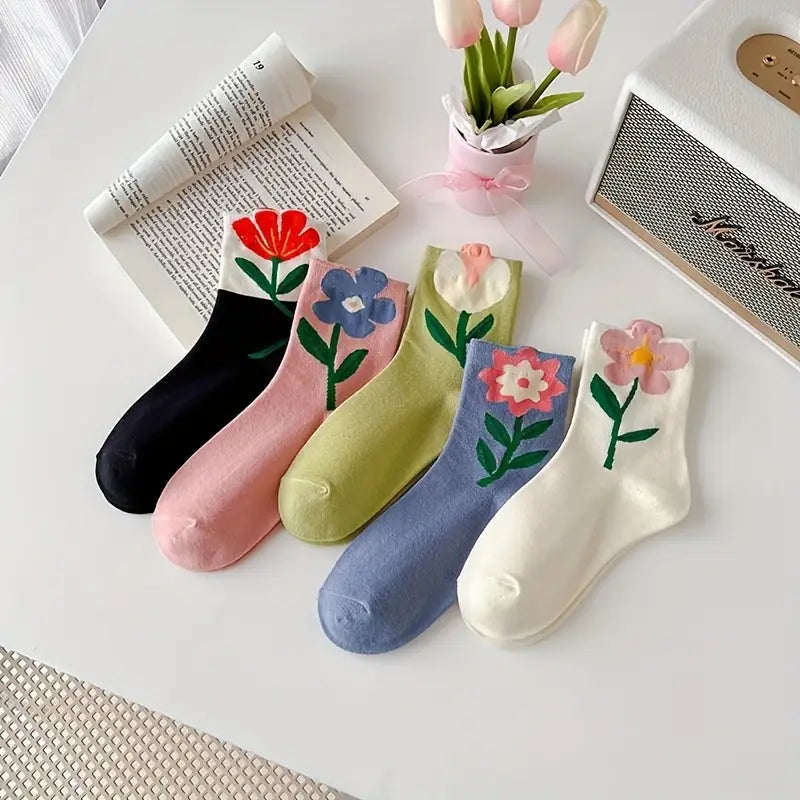 Comfortable women's mid-calf floral socks. Breathable cotton blend, moisture-wicking 5 pack for all-day wear.