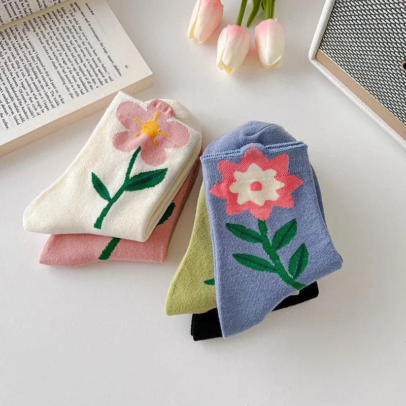 Stylish women's mid-calf floral socks set. Vibrant patterned cotton blend, a comfortable 5-pair pack.