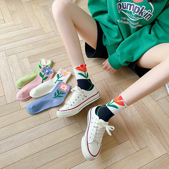 Women's mid-calf floral socks 5 pack. Stylish, breathable, and moisture-wicking cotton blend for comfort.