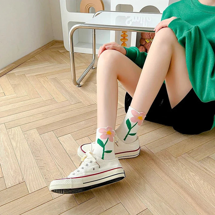 5-pair women's mid-calf floral socks set. Cotton blend for comfort, breathable and stylish patterns.