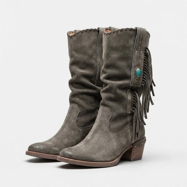 Versatile women's mid-calf fringe boots, western-inspired, with a comfortable block heel.