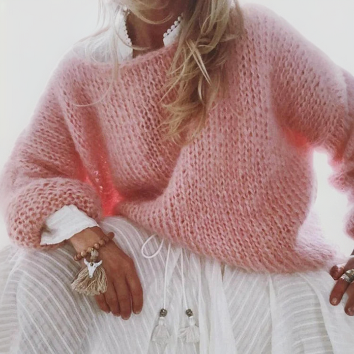 Versatile Women's Milena sweater, ideal for all-season wear. Stylish round neck top with a relaxed, comfortable fit.