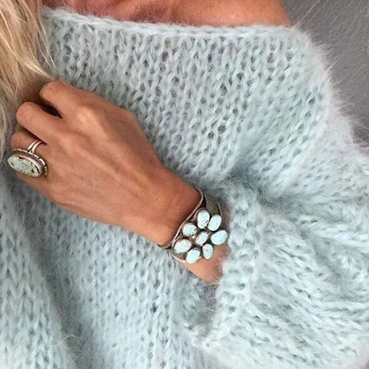 Soft Milena women's sweater with a flattering round neck. Comfortable relaxed fit, perfect for stylish casual or everyday wear.