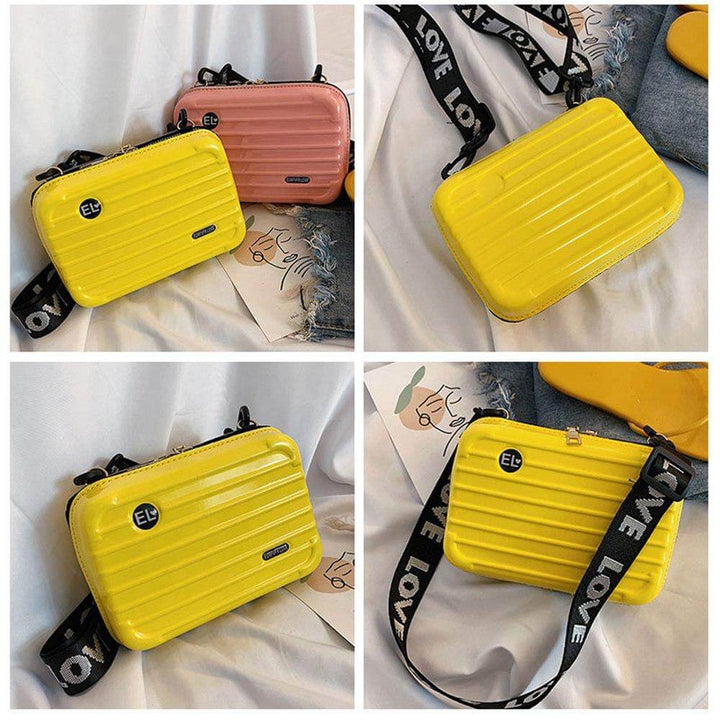 Fashionable women's black hard shell crossbody bag, durable travel style