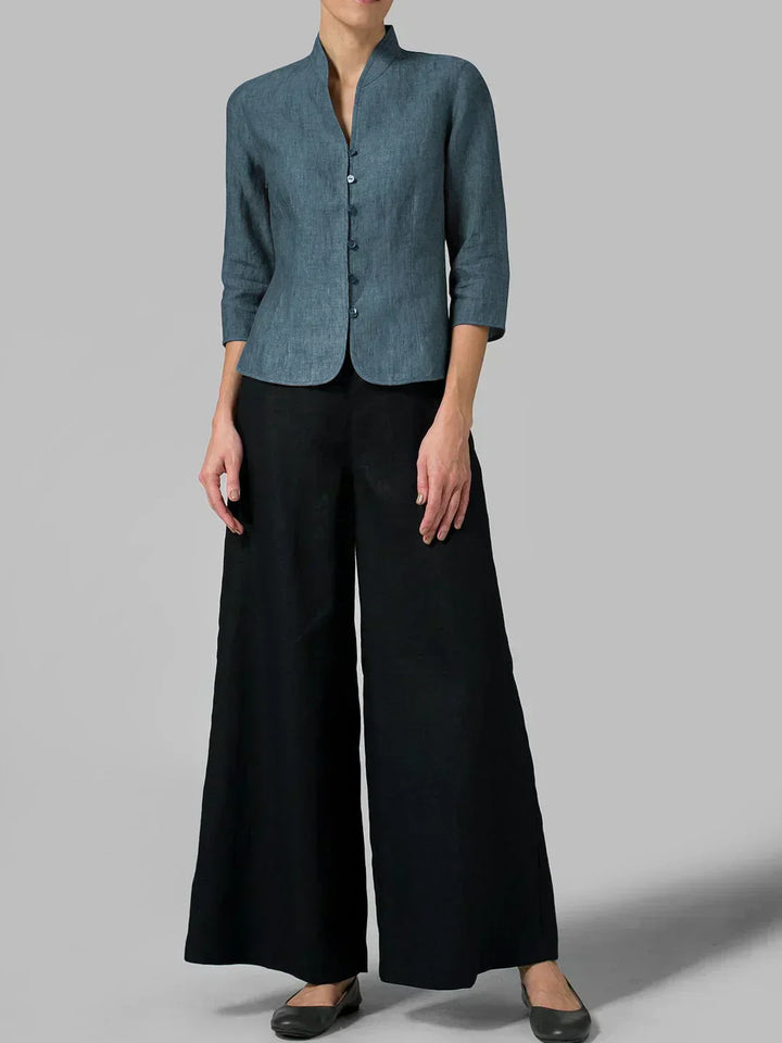 Modern women's 3/4 sleeve blouse featuring button front, a chic and comfortable work or spring top.