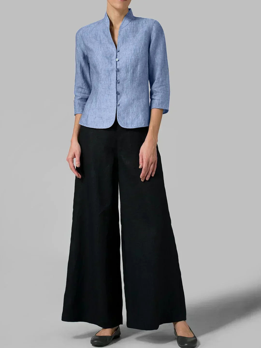 Simple women's 3/4 sleeve button front blouse, a versatile minimalist top for office & casual wear.
