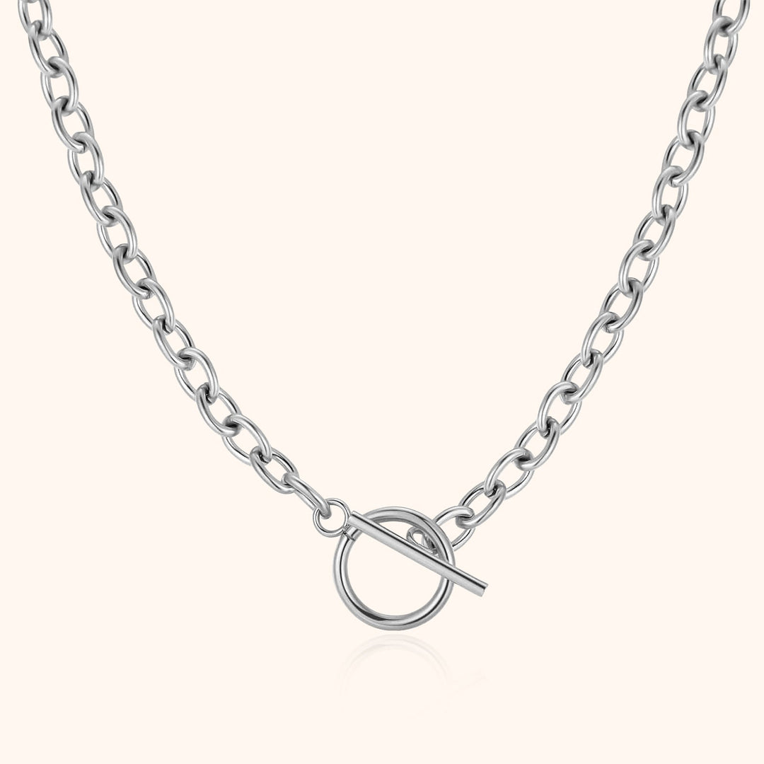 Stylish women's minimalist geometric necklace in radiant gold or sleek silver, a versatile delicate jewelry piece.