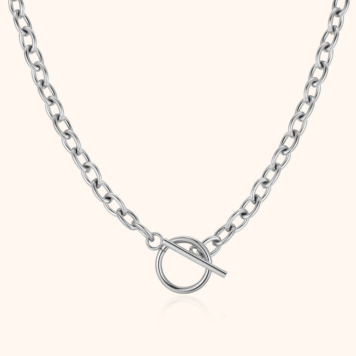 Stylish women's minimalist geometric necklace in radiant gold or sleek silver, a versatile delicate jewelry piece.