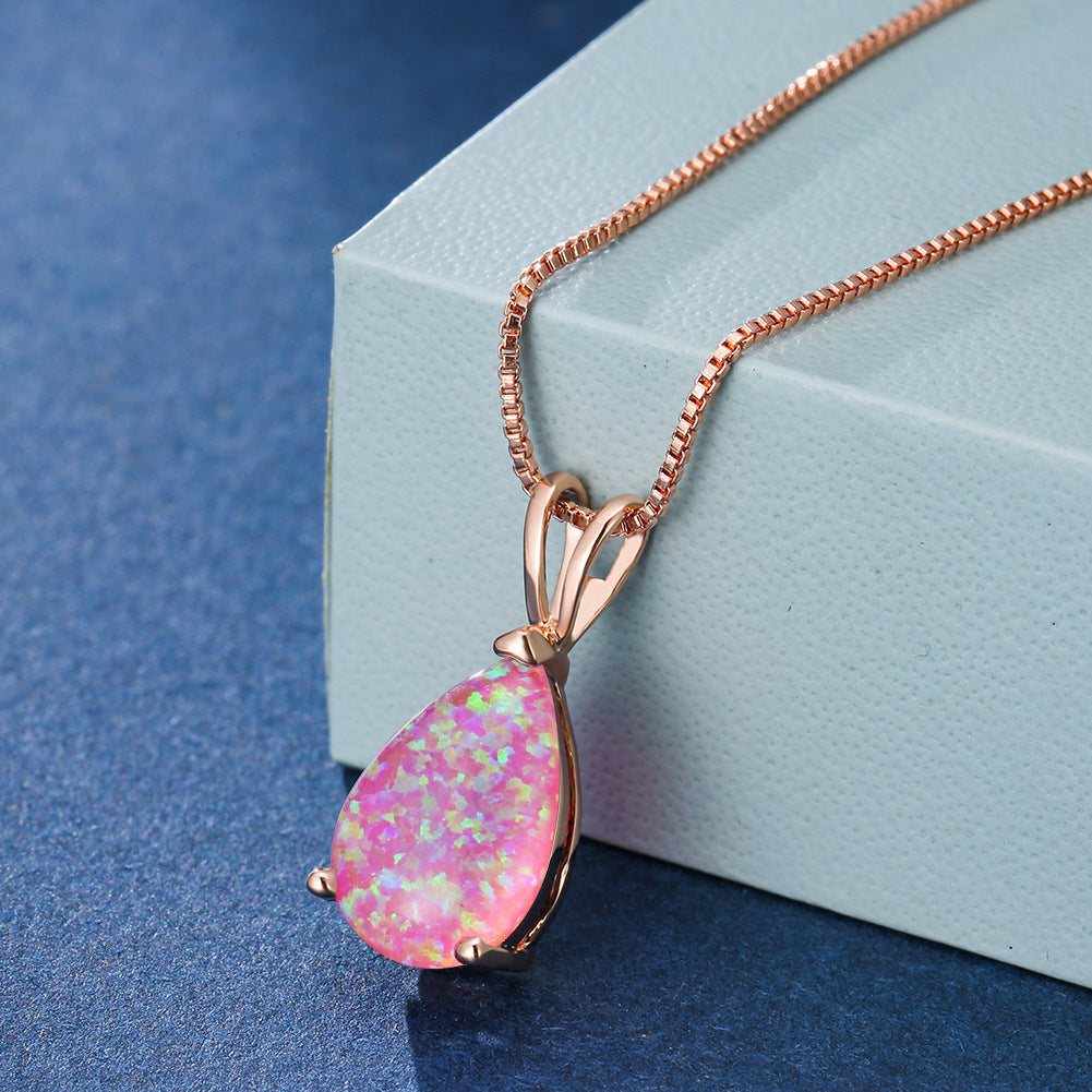 Rose gold minimalist opal necklace. Dainty drop pendant, perfect women's jewelry with adjustable chain.