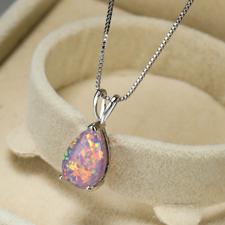 Women's elegant opal drop necklace. Minimalist design, a beautiful gemstone gift for her.