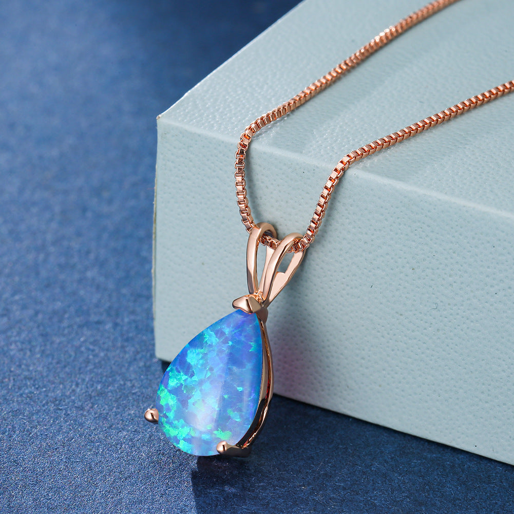 Elegant women's opal drop pendant necklace. Rose gold tone, ideal minimalist jewelry for her.